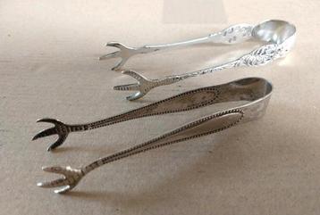 Twee verzilverde klauw suiker klontjestangen siermotief beschikbaar voor biedingen