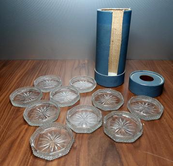 Antieke glazen onderzetters uit de glasfabriek van Leerdam. beschikbaar voor biedingen