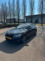 BMW 1-Serie 118i 136pk Aut 2017 Zwart, 65 €/maand, 1295 kg, Alcantara, Zwart