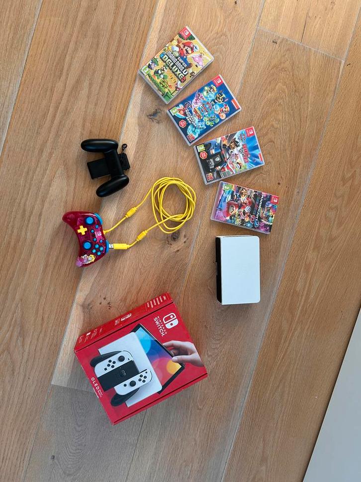 Nintendo Switch Oled Games & Extra Controller, Spelcomputers en Games, Spelcomputers | Nintendo Game Boy, Zo goed als nieuw, Overige modellen