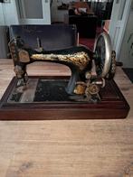 Antieke naaimachine, Ophalen