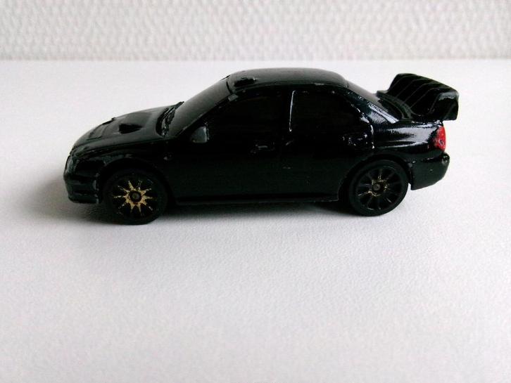 Subaru Impreza WRC zwart 1:57 Majorette (geen ovp), Hobby en Vrije tijd, Modelauto's | Overige schalen, Gebruikt, Auto, Ophalen of Verzenden