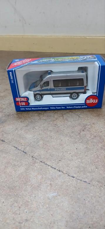 Siku politie busje mercedes beschikbaar voor biedingen