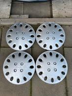 Set originele Opel Corsa B wieldoppen 13” inch, Ophalen of Verzenden, Gebruikt