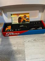 Tekno volvo 8x4 van der vlist met goldhofer dieplader, Hobby en Vrije tijd, Modelauto's | 1:50, Verzenden, Zo goed als nieuw, Bus of Vrachtwagen