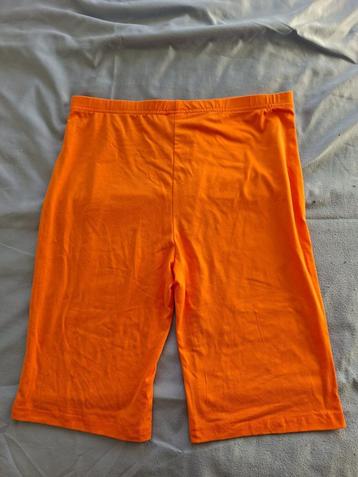 Korte Oranje Legging maat L !! beschikbaar voor biedingen