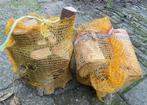 Te koop zakken gedroogd haardhout € 4,00 per zak, Tuin en Terras, Haardhout, Minder dan 3 m³, Ophalen of Verzenden, Overige houtsoorten