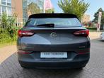 Opel Grandland X 1.6 Turbo Plug-In Hybrid 4x4 Business Elega, Auto's, Automaat, Stof, Gebruikt, Zwart