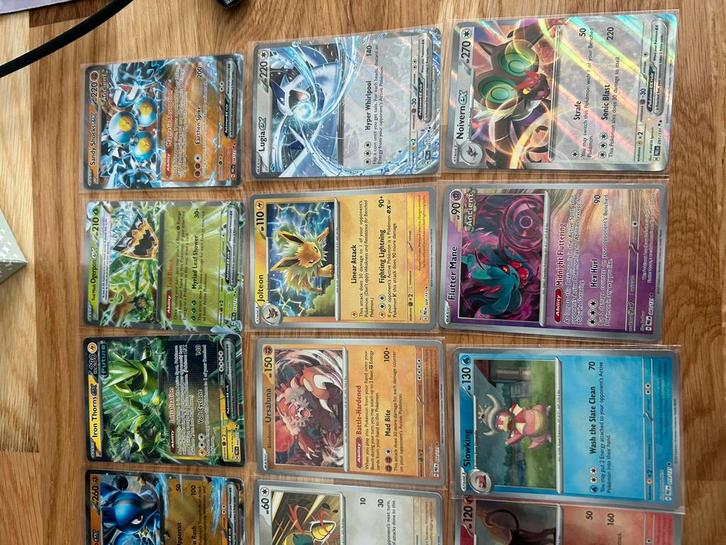 Prismatic Evolutions - Pokeballs - Trainers - Ex kaarten, Hobby en Vrije tijd, Verzamelkaartspellen | Pokémon, Zo goed als nieuw