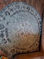 Mooi rond vloerkleed, Ophalen