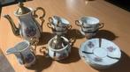 Antiek Servies. Goudkleurig met opdruk. Koffieservies., Ophalen