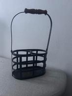 Metalen flessenrek, Ophalen, Gebruikt