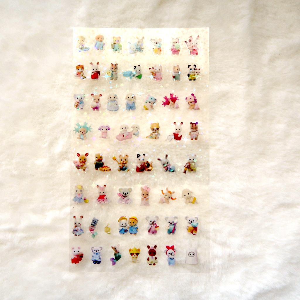 Sylvanian Family Stickervel met hologram ster afwerking, Verzamelen, Verzenden, Nieuw, Plaatje, Poster of Sticker