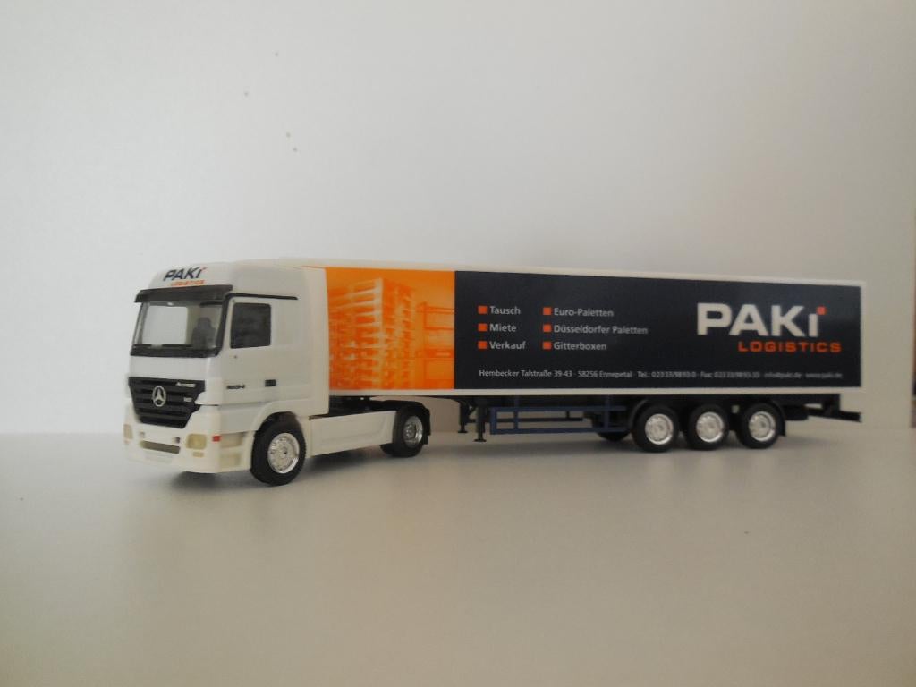 1:87 Herpa - Paki Logistic, Ophalen of Verzenden, Zo goed als nieuw, Bus of Vrachtwagen, Herpa
