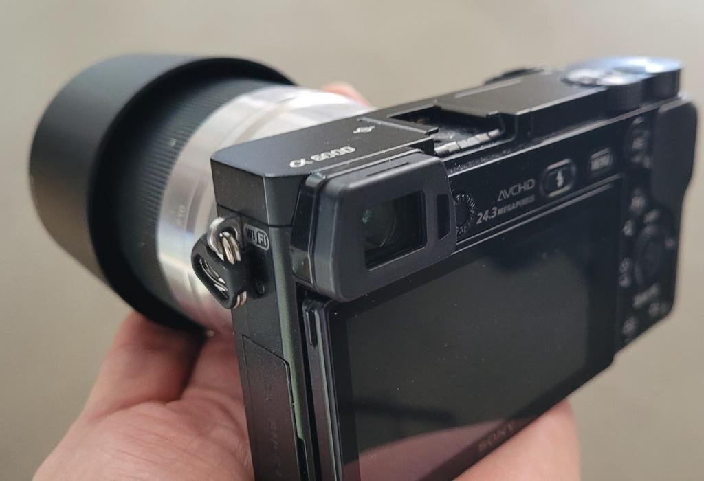 Mooie Sony a6000 net telezoomlens 55-210, 20x of meer, Ophalen of Verzenden, Zo goed als nieuw, Sony