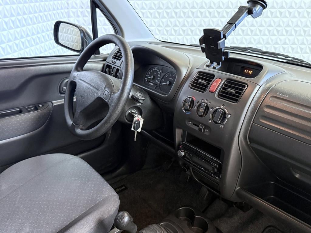 Suzuki Wagon R+ 1.3 in goede staat! AIRCO / 154.000km (2003), Auto's, Voorwielaandrijving, 4 cilinders, Wagon R+, Bedrijf