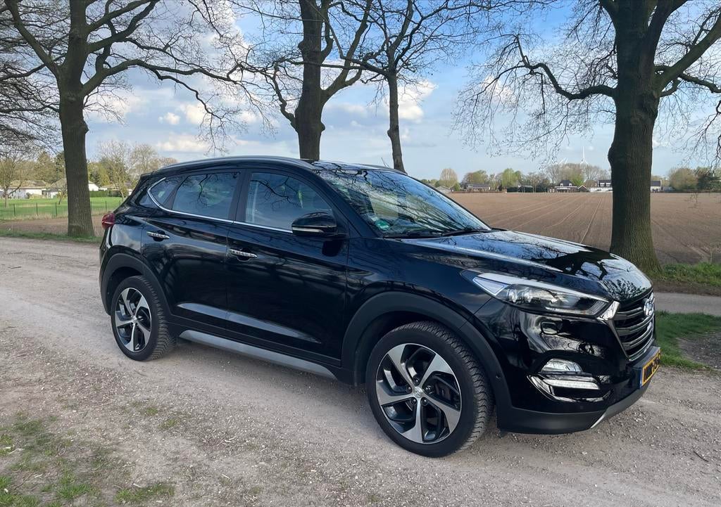 Hyundai TUCSON 1.6 T-GDI Premium 4WD, trekhaak, (11-2017), Lichtsensor, 4 cilinders, Zwart, Leder