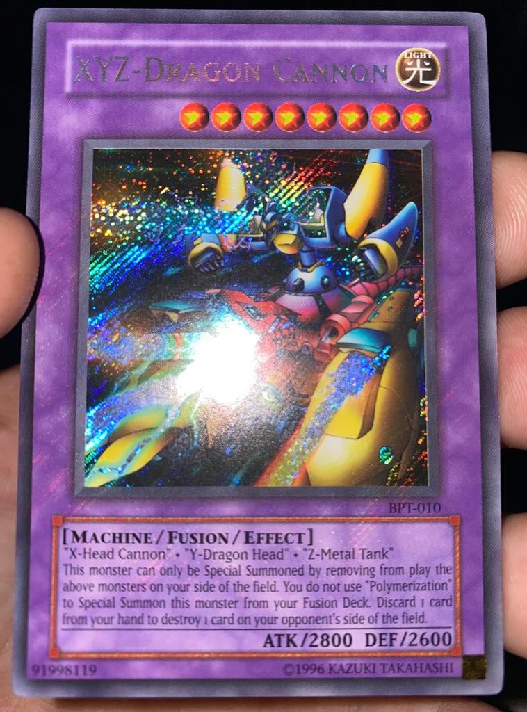Yu-Gi-Oh! XYZ-Dragon Cannon BPT Old Tim Promo !, Ophalen of Verzenden, Zo goed als nieuw, Losse kaart, Foil