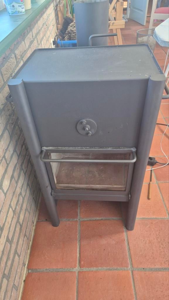 Harrie Leenders Houtkachel HL2, Ophalen