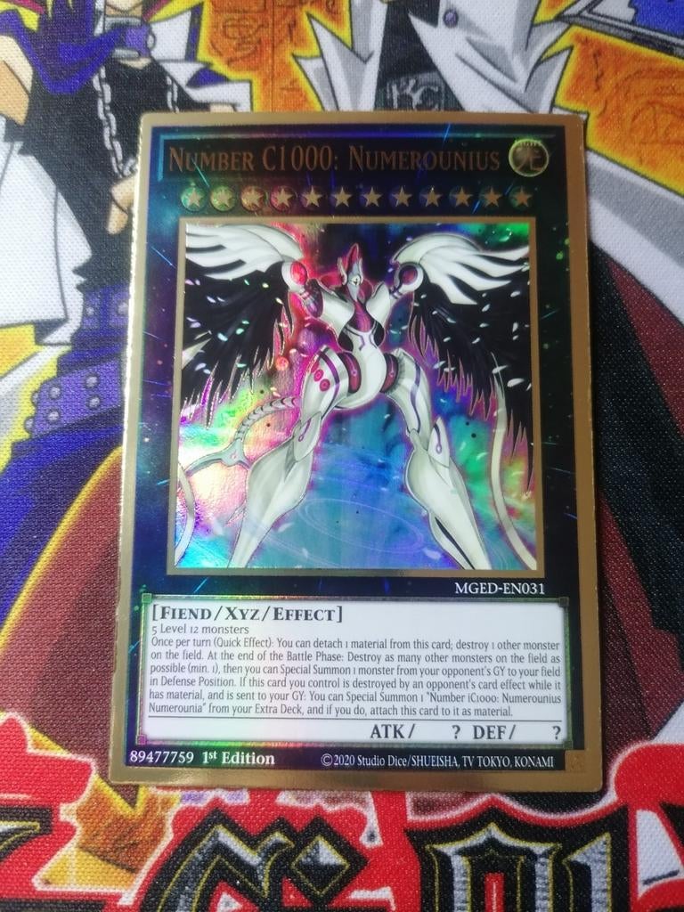 Number C1000: Numerounius - Premium Gold Rare MGED Yu-Gi-Oh, Ophalen of Verzenden, Zo goed als nieuw, Foil