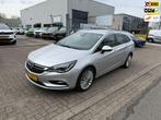 Opel Astra Sports Tourer 1.4 Turbo 120 Jaar Edition, Navi, N, Auto's, Voorwielaandrijving, Stof, Gebruikt, Euro 6