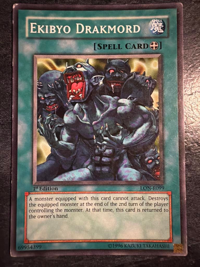 Yu-Gi-Oh! Ekibyo Drakmord Spell Card 1st Edition LON-E099, Ophalen of Verzenden, Zo goed als nieuw, Losse kaart