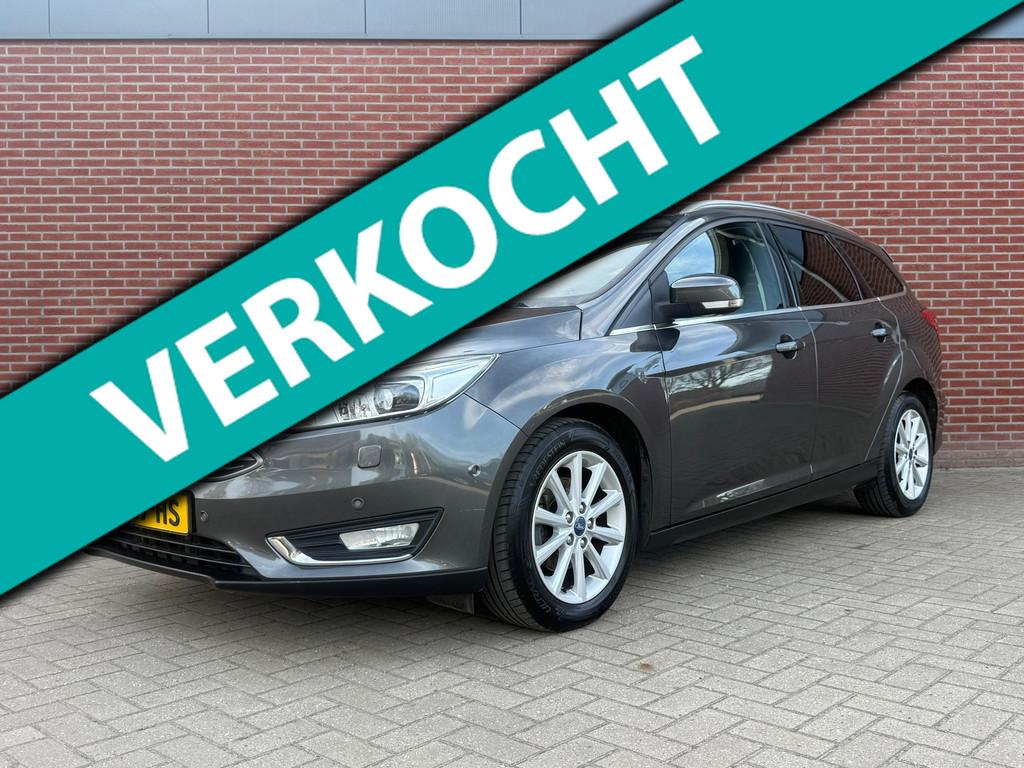 Ford Focus Wagon 1.0 Titanium Edition / Airco / Cruise / PDC, 125 pk, Gebruikt, Euro 6, Leder en Stof