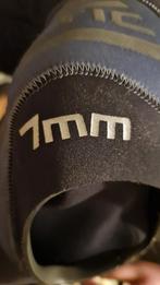 Te koop. Bare duikpak dubbel 7  als nieuw 2 x mee gedoken, Watersport en Boten, Ophalen, Zo goed als nieuw, Duikpak