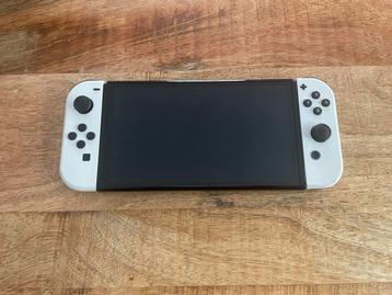 Nintendo Switch OLED Wit + Games & Extra Controller! beschikbaar voor biedingen