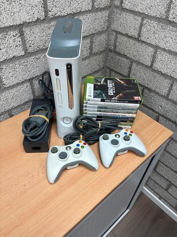 Xbox 360 Console met 2 Controllers + 8 Games beschikbaar voor biedingen