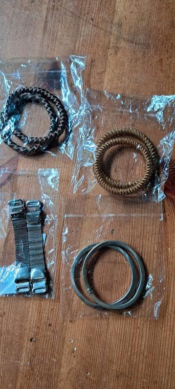 4x mouw ophouders beschikbaar voor biedingen