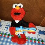 Elmo knuffel met leren jas en gitaar 24 cm groot, Ophalen of Verzenden