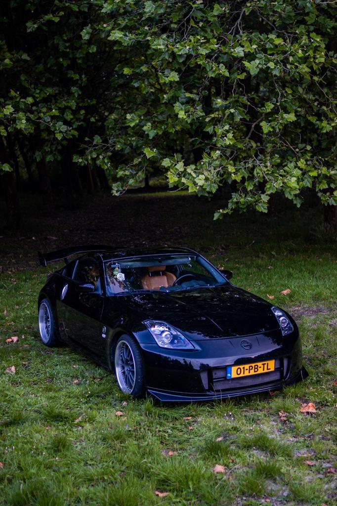 Nissan 350Z 3.5 V6 24V 2004 Zwart, Auto's, Nissan, 350Z, Benzine, G, Coupé, Handgeschakeld, Origineel Nederlands, Zwart, Leder
