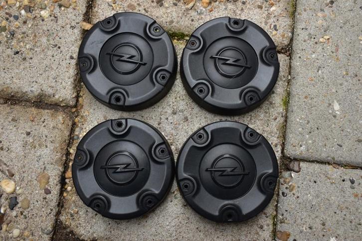 Set van 4 originele naaf wieldoppen Opel Combo, Auto diversen, Wieldoppen, Gebruikt, Ophalen of Verzenden