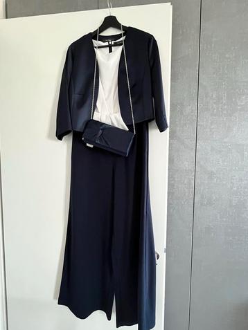 Donkerblauw /wit Jumpsuit met Jasje & Tasje beschikbaar voor biedingen