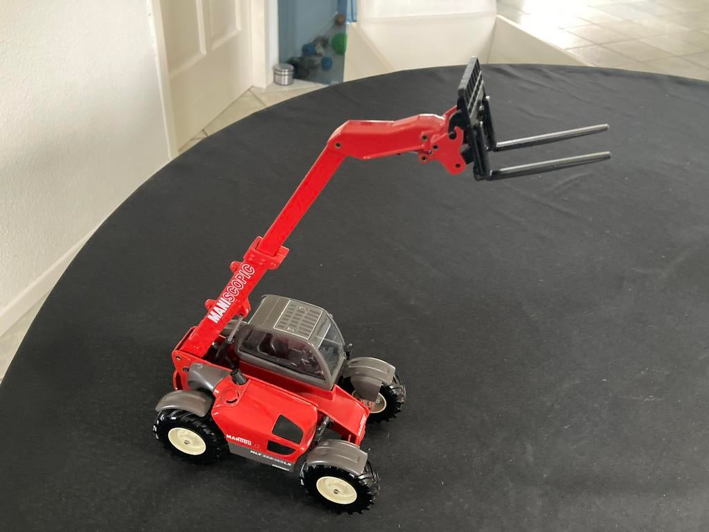 Schaalmodel  siku mani scopig mlt 633-120 LS, Hobby en Vrije tijd, Ophalen of Verzenden, Zo goed als nieuw, Bus of Vrachtwagen