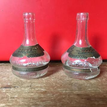 Vintage flesjes Herman Jansen 2x beschikbaar voor biedingen