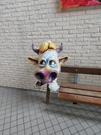 Oude karnaval masker papier maché, Ophalen