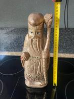 Chinees Houten Beeld, Ophalen