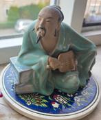 Oosters beeldje van een wijze man, Ophalen