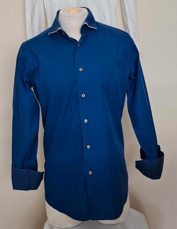 "The Blueprint" Blauw overhemd, leuke details.Mt.M.Als nieuw beschikbaar voor biedingen