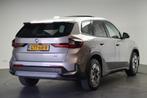 BMW iX1 eDrive20 / Panoramadak / Adaptieve LED / Comfort Acc, Stof, Gebruikt, 750 kg, Met garantie (alle)