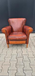 Schapenleren fauteuil, Ophalen