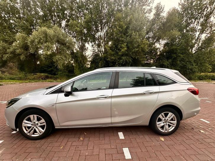Opel Astra 1.4 Turbo 150pk Sports Tourer 2018 Grijs, Auto's, Opel, Particulier, Astra, ABS, Airbags, Airconditioning, Apple Carplay