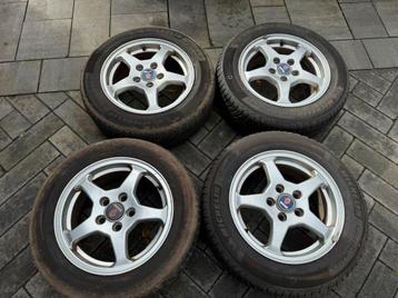 Set Saab 15" velgen met Michelin all season banden beschikbaar voor biedingen