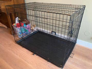 Zwarte hondenbench 107x70x77 beschikbaar voor biedingen