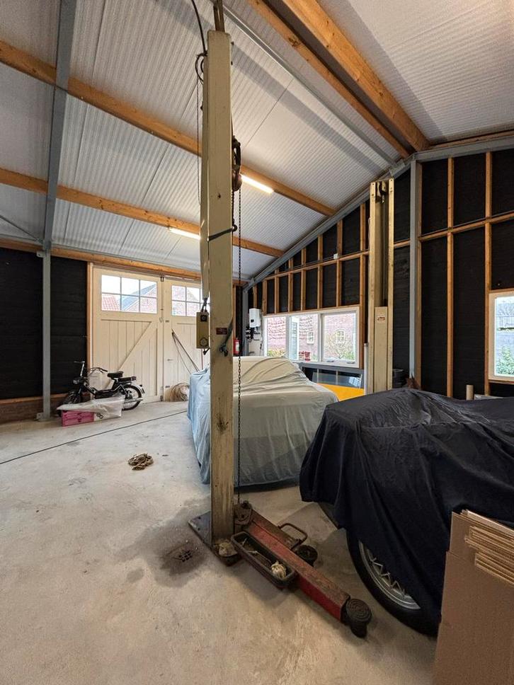 Stertil Koni Autolift KS 2025  tweekolms hefbrug, Zakelijke goederen, Machines en Bouw | Industrie en Techniek, Ophalen