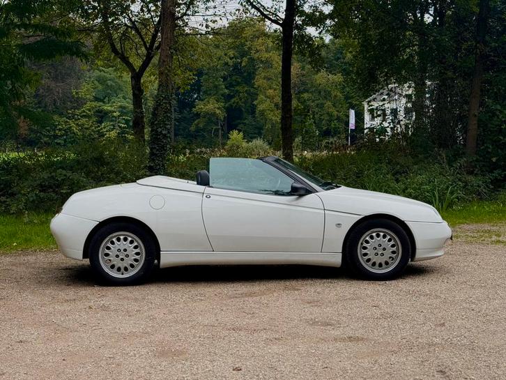 Alfa Romeo Spider 2.0 Twin Spark 16V 1997 Wit, Auto's, Alfa Romeo, Particulier, Spider, Bluetooth, Lederen bekleding, Lichtmetalen velgen