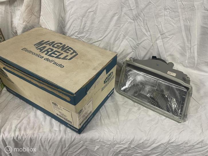 Koplamp origineel rechts Fiat Uno (Turbo) 1989 - < in doos, Auto-onderdelen, Verlichting, Nieuw, Ophalen of Verzenden