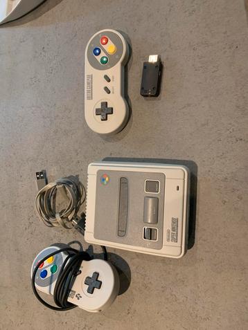 SNES mini met 2 controller beschikbaar voor biedingen